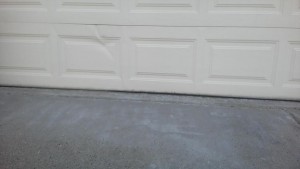 Dented Garage Door Panel